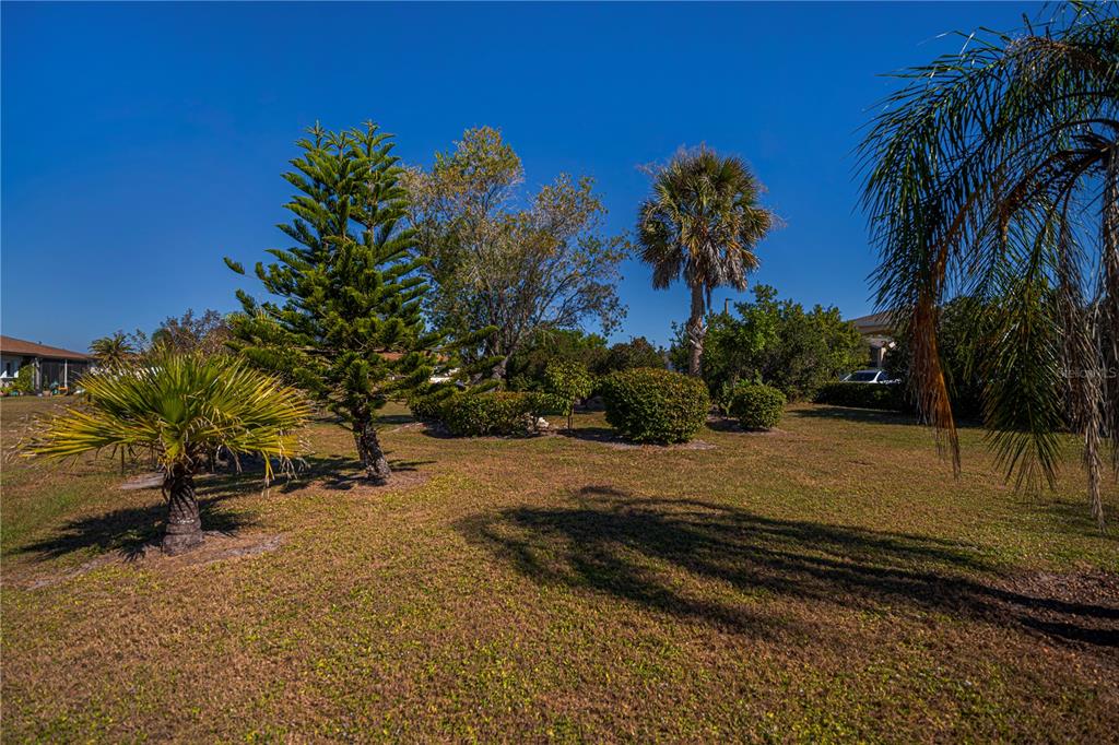 25275 Rampart Boulevard, Unit 1802 Punta Gorda, FL 33983 - Photo 35 of 41 a view of a backyard