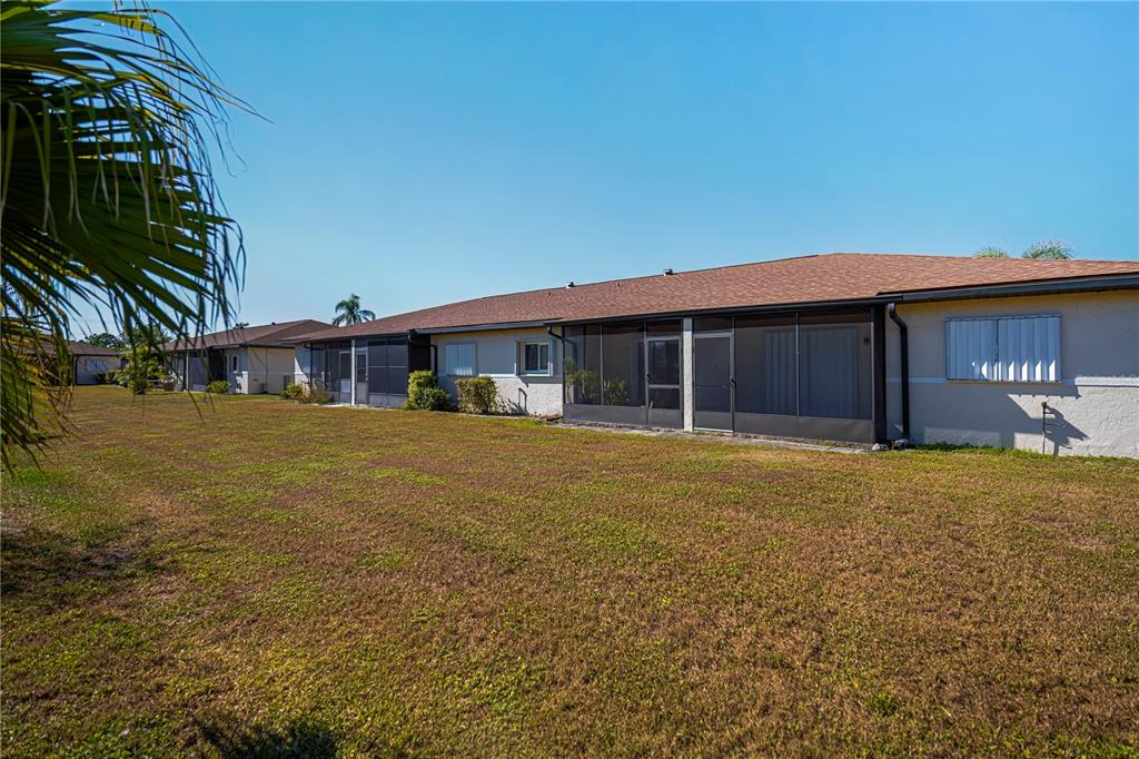 25275 Rampart Boulevard, Unit 1802 Punta Gorda, FL 33983 - Photo 36 of 41 a front view of house with yard
