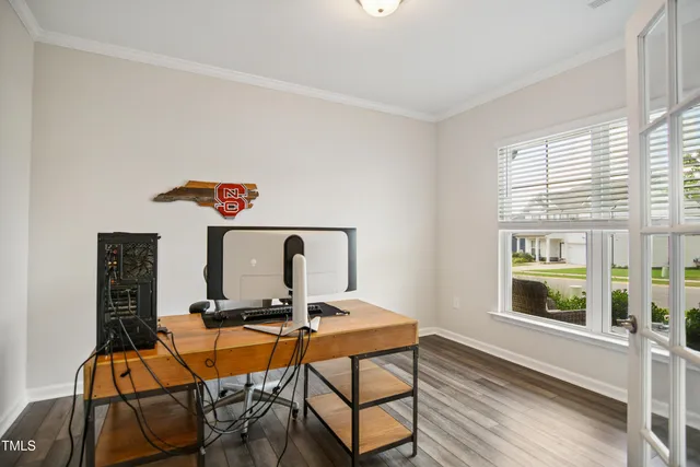 a room with a table and chairs