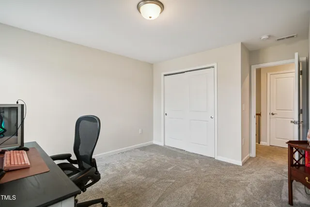 a view of workspace with lounge chair