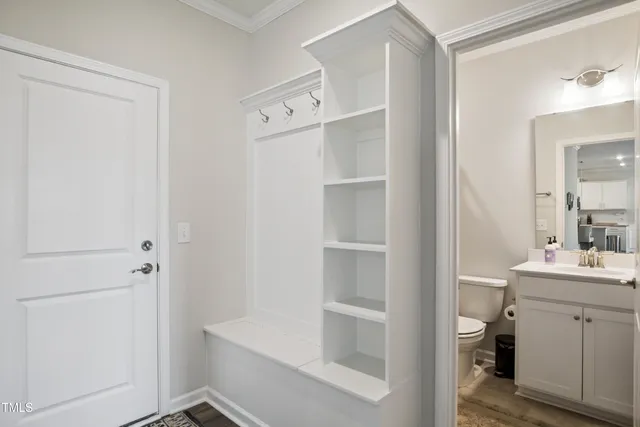 a bathroom with a sink toilet and tub