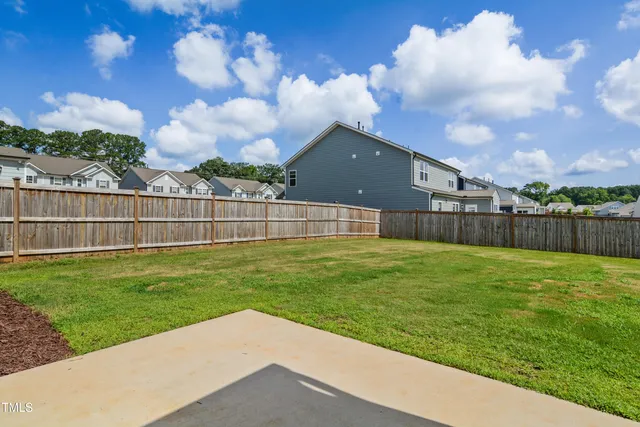a view of a backyard with a garden
