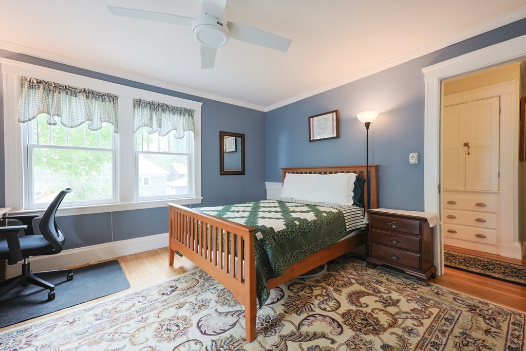 14 Merrill Road Marblehead, MA 01945 - Photo 13 of 29 a bedroom with a bed and a window