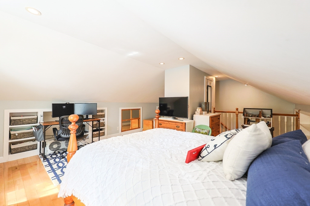 14 Merrill Road Marblehead, MA 01945 - Photo 20 of 29 a bed room with a bed and a television