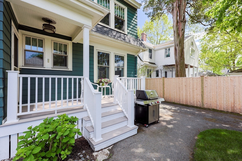 14 Merrill Road Marblehead, MA 01945 - Photo 24 of 29 a front view of a house with a garden