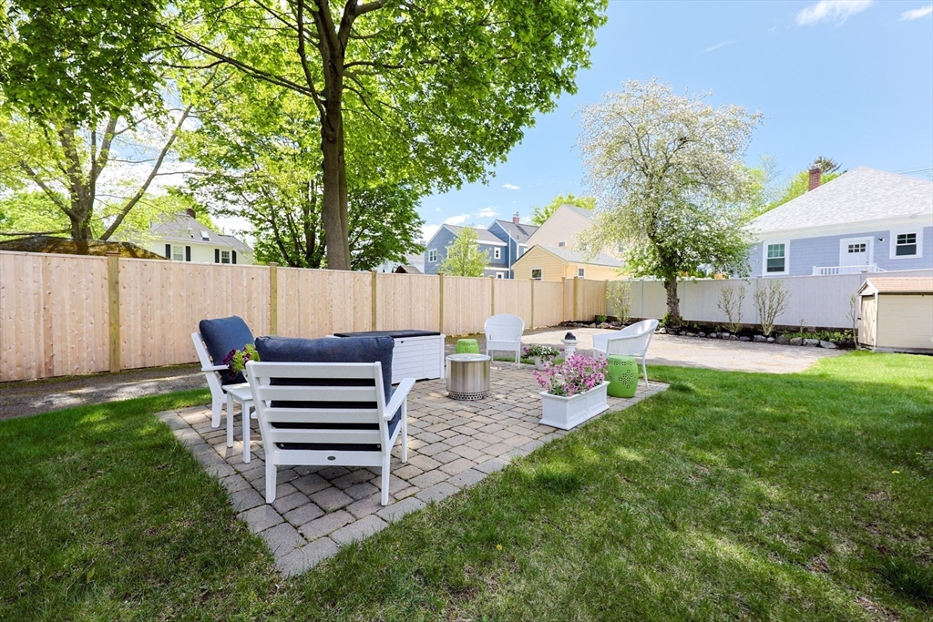 14 Merrill Road Marblehead, MA 01945 - Photo 27 of 29 a view of a house with backyard and sitting area