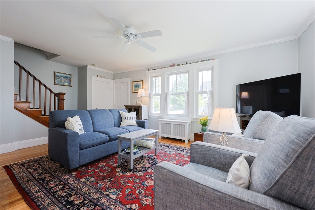 14 Merrill Road Marblehead, MA 01945 - Photo 3 of 29 a living room with furniture and a flat screen tv