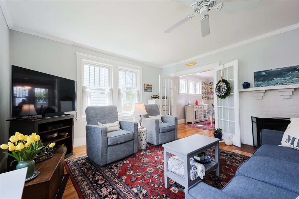 14 Merrill Road Marblehead, MA 01945 - Photo 4 of 29 a living room with furniture fireplace and flat screen tv