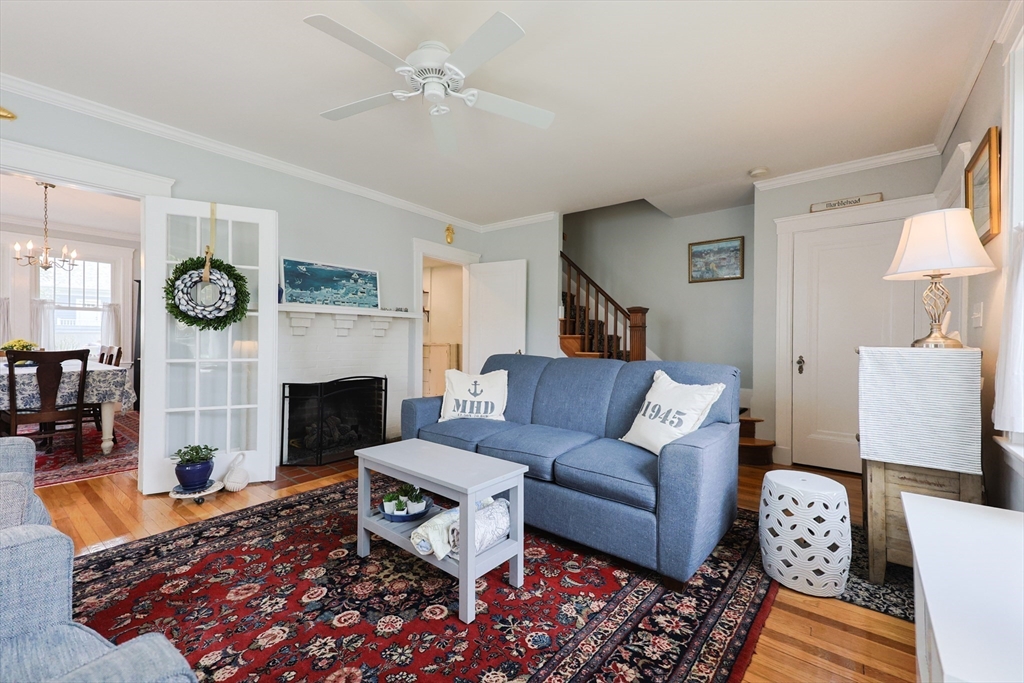 14 Merrill Road Marblehead, MA 01945 - Photo 5 of 29 a living room with furniture and a fireplace