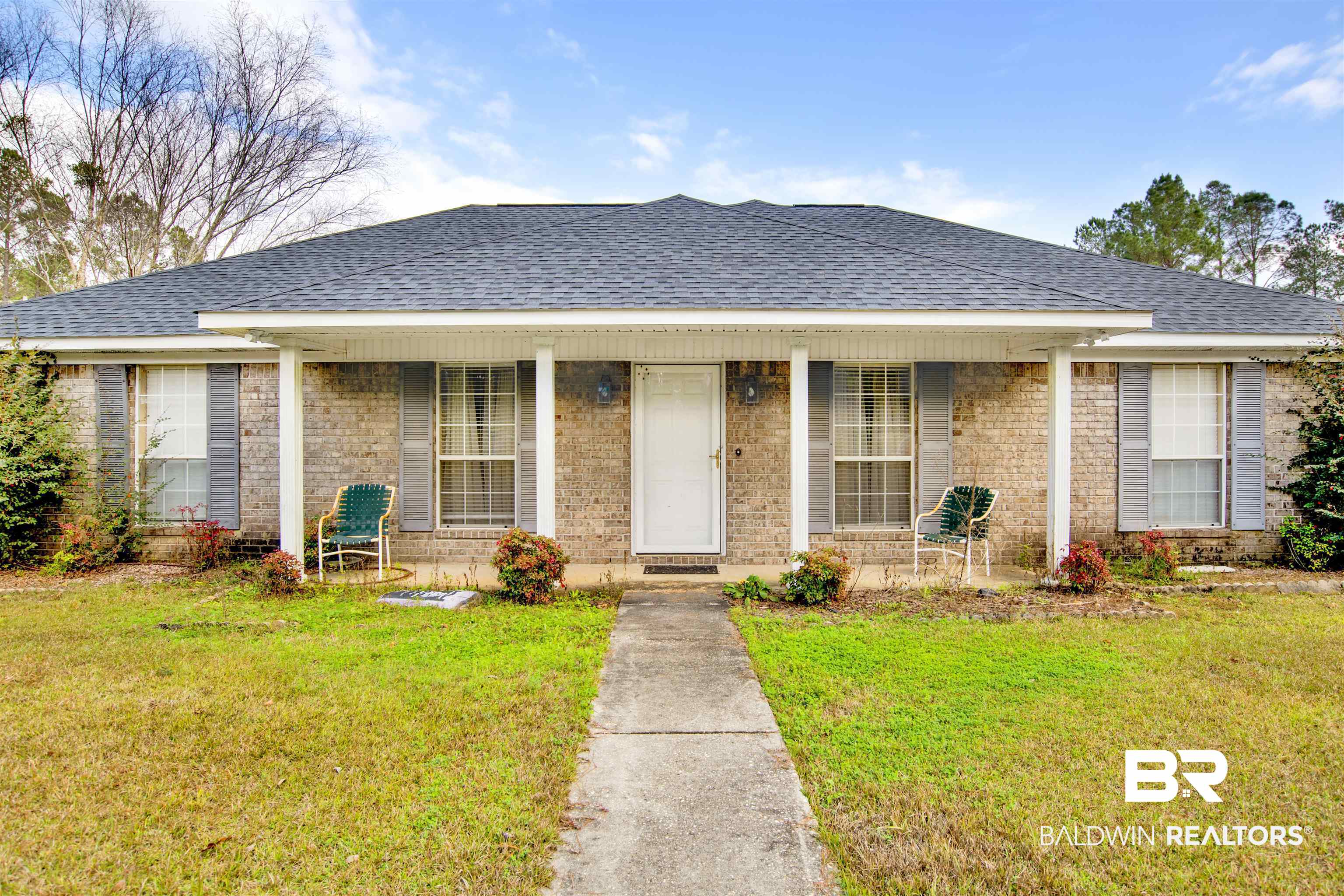 36434 Alexandria Trail Stapleton, AL 36578 - Photo 27 of 27 View of front of house with a front yard, a porch, and a shingled roof