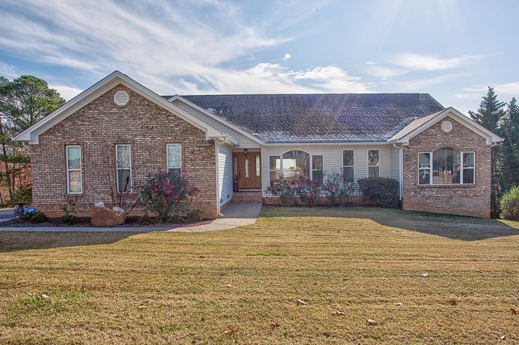 323 Mill Hamlet Road Northwest Charleston, TN 37310 - Photo 2 of 44 a view of a house with a swimming pool