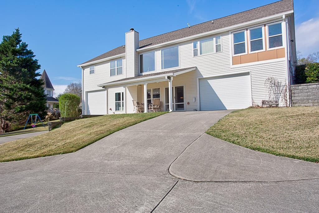323 Mill Hamlet Road Northwest Charleston, TN 37310 - Photo 27 of 44 a front view of a house with a yard