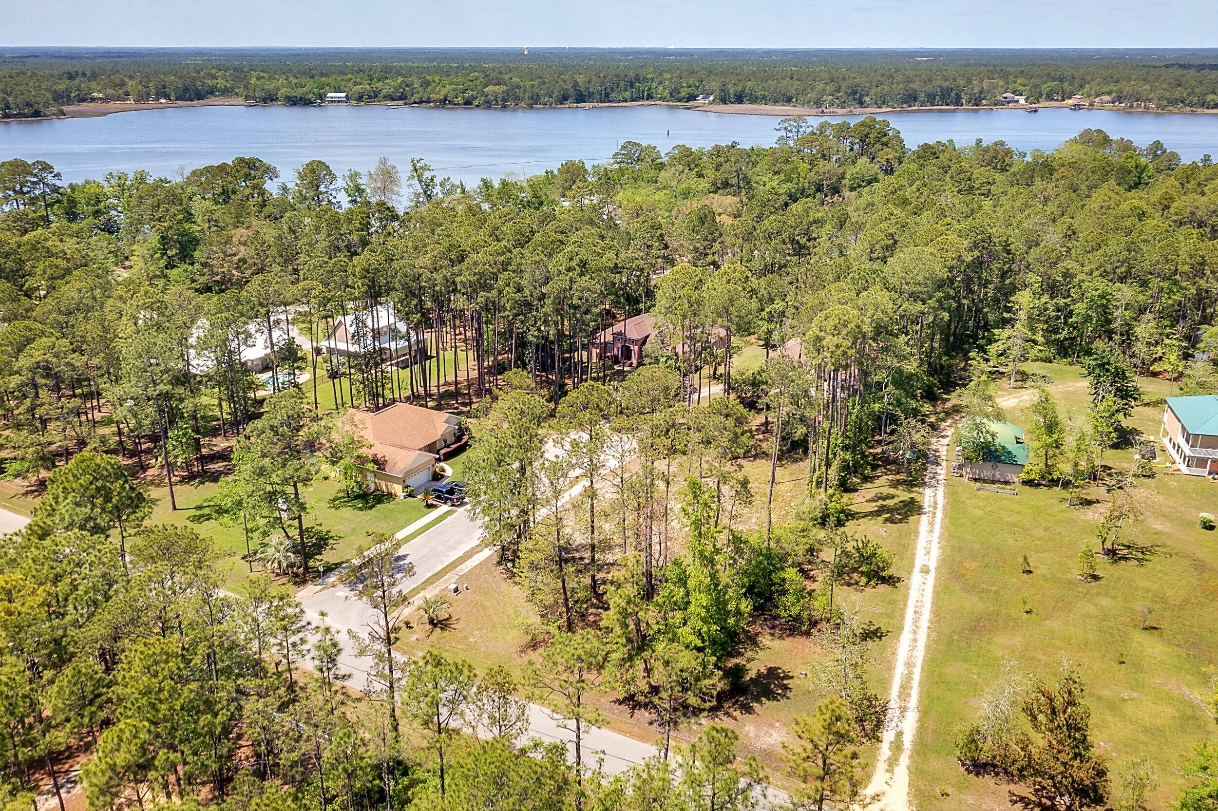 Lot 2 Capri Court Freeport, FL 32439 - Photo 3 of 8 a view of a lake with a mountain view