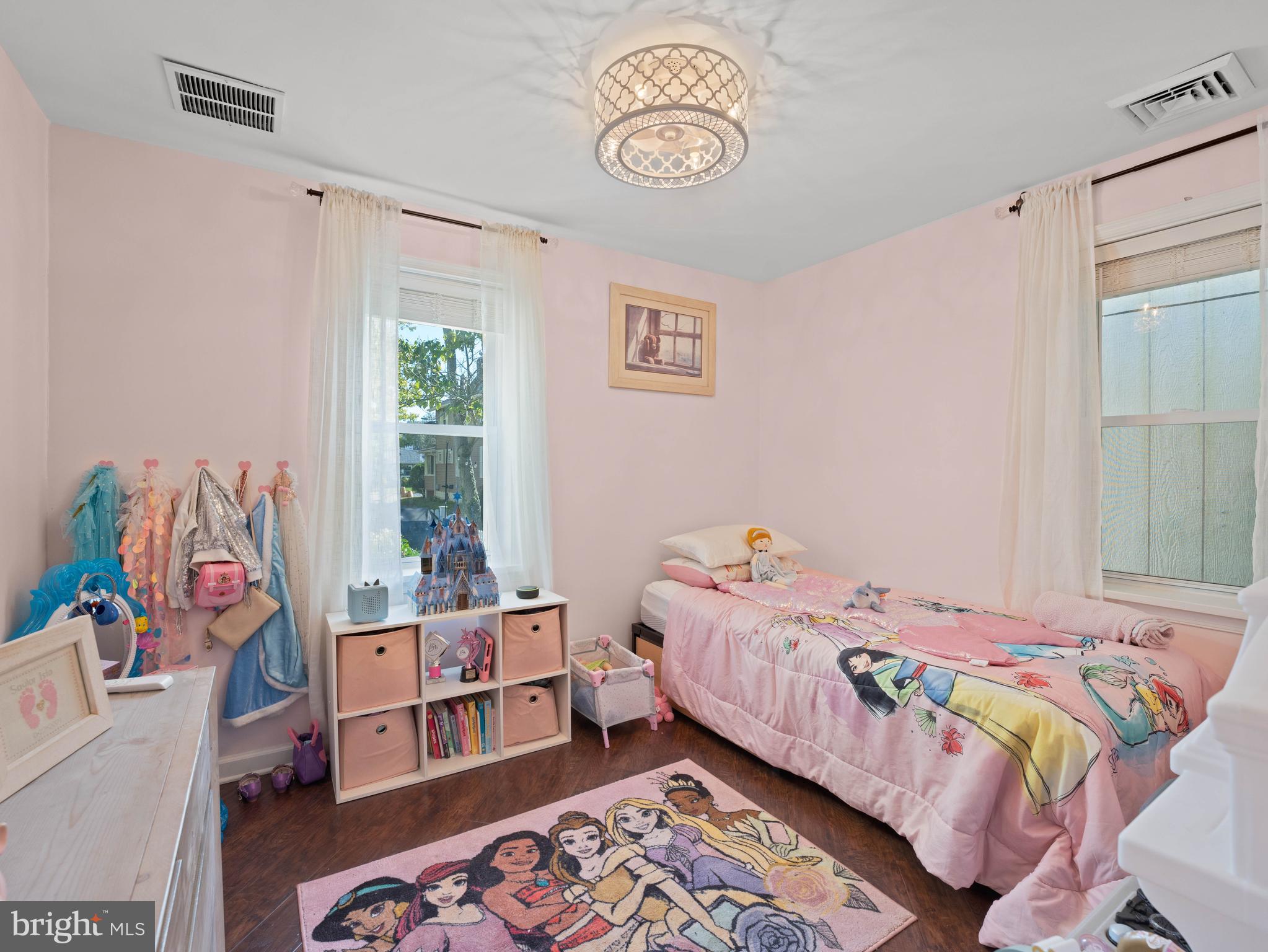 303 Garden Terrace Somers Point, NJ 08244 - Photo 15 of 38 a bedroom with a bed and a window