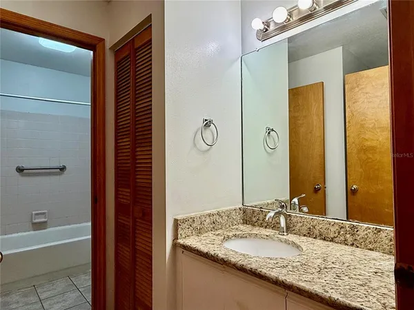 a bathroom with a shower and a toilet