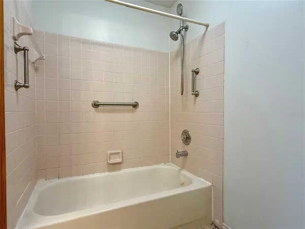 a view of a porch with wooden floor