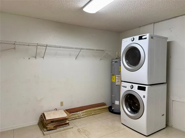 a view of swimming pool with a patio