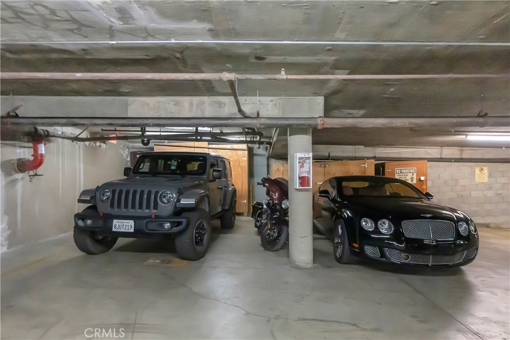 1 3rd Place, Unit 302 Long Beach, CA 90802 - Photo 44 of 51 a car parked in garage