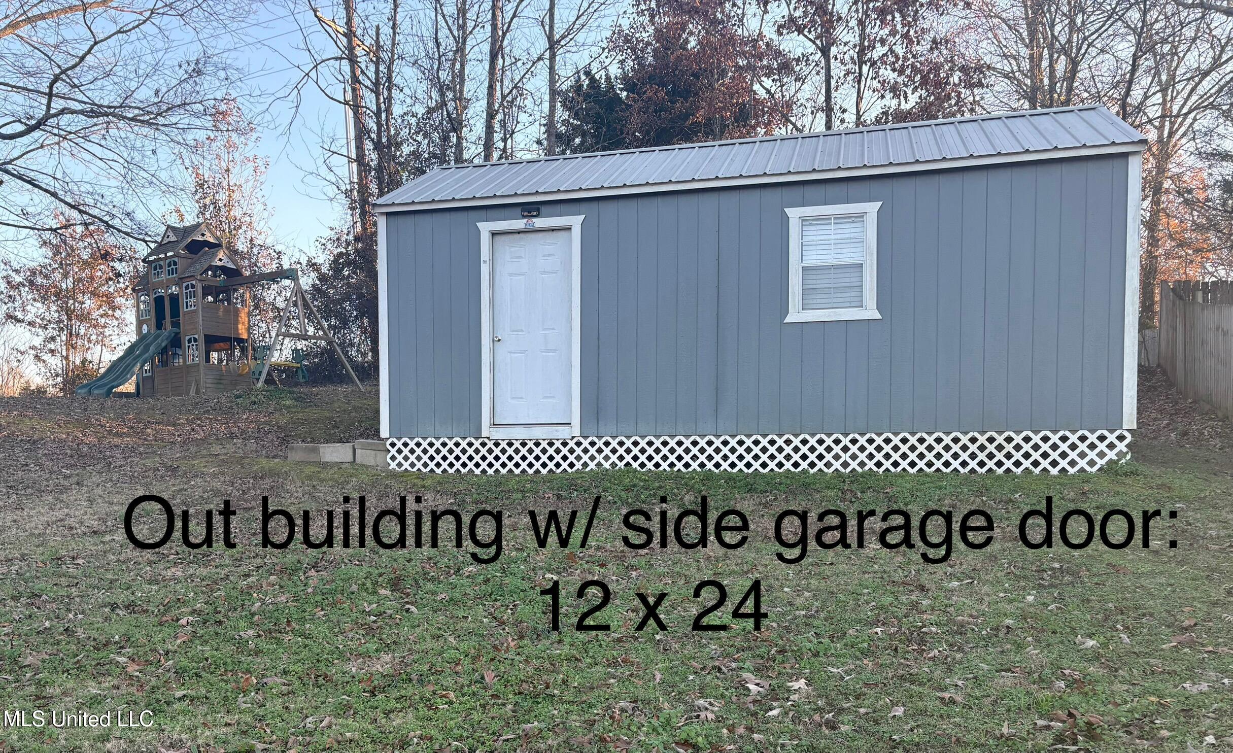 4547 Star Landing Road Nesbit, MS 38651 - Photo 25 of 28 Outbuilding and play area