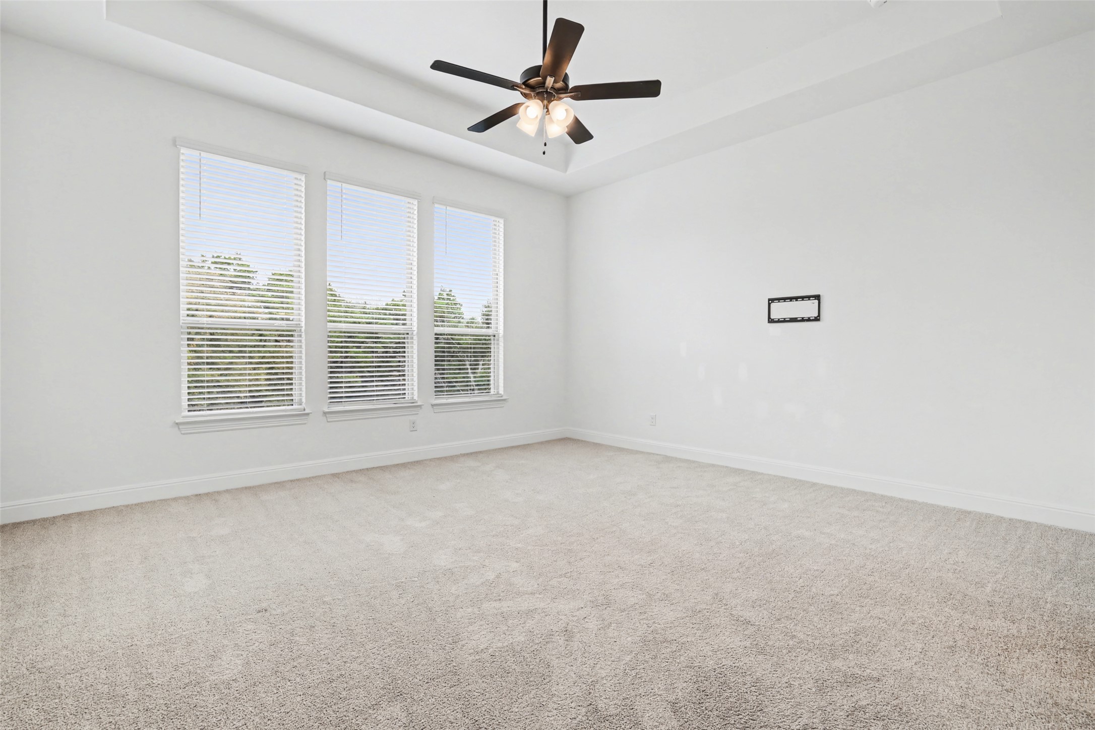 104 Rocky River Road Georgetown, TX 78628 - Photo 15 of 39 an empty room with windows and fan