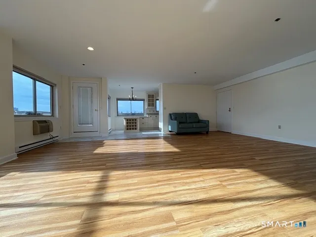 a living room with a couch and a stove