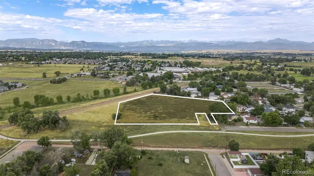 a view of a city with an ocean