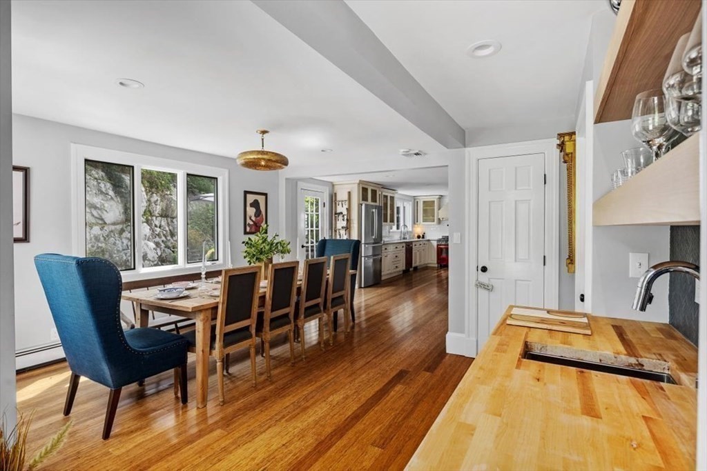 241 Jerusalem Road Cohasset, MA 02025 - Photo 16 of 42 a view of a dining room with furniture window and wooden floor