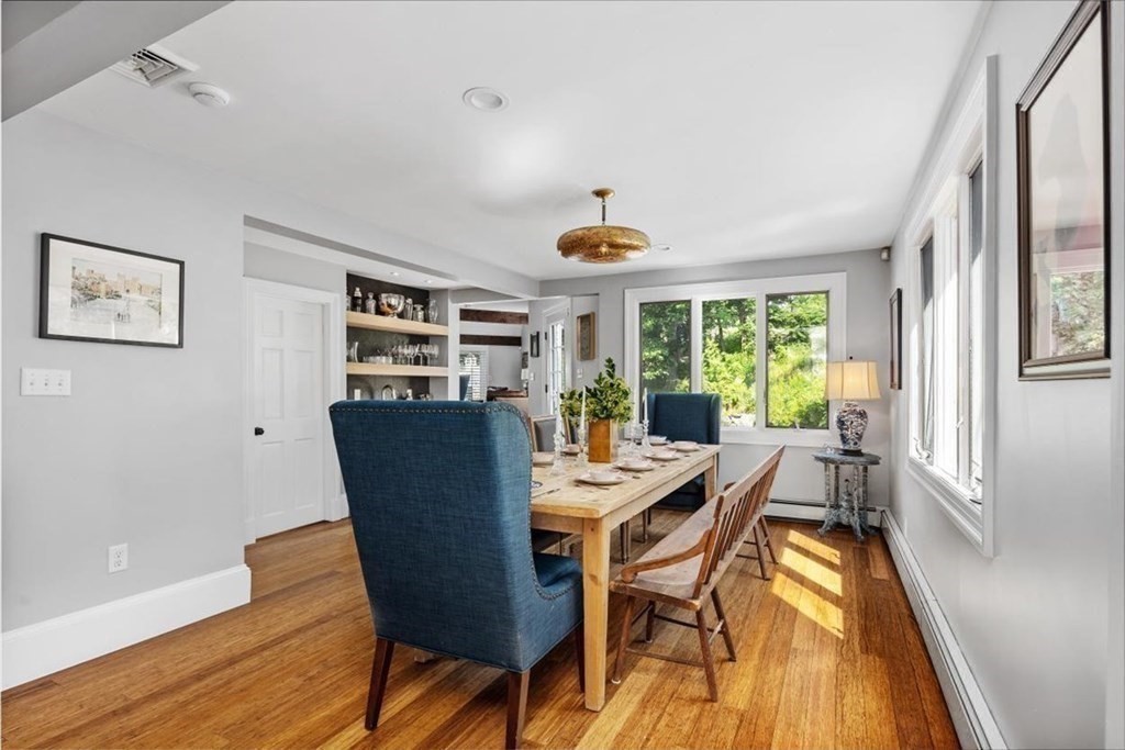 241 Jerusalem Road Cohasset, MA 02025 - Photo 18 of 42 a view of a dining room with furniture and wooden floor