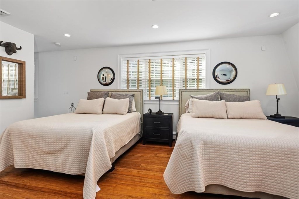 241 Jerusalem Road Cohasset, MA 02025 - Photo 27 of 42 a bedroom with a bed and a window