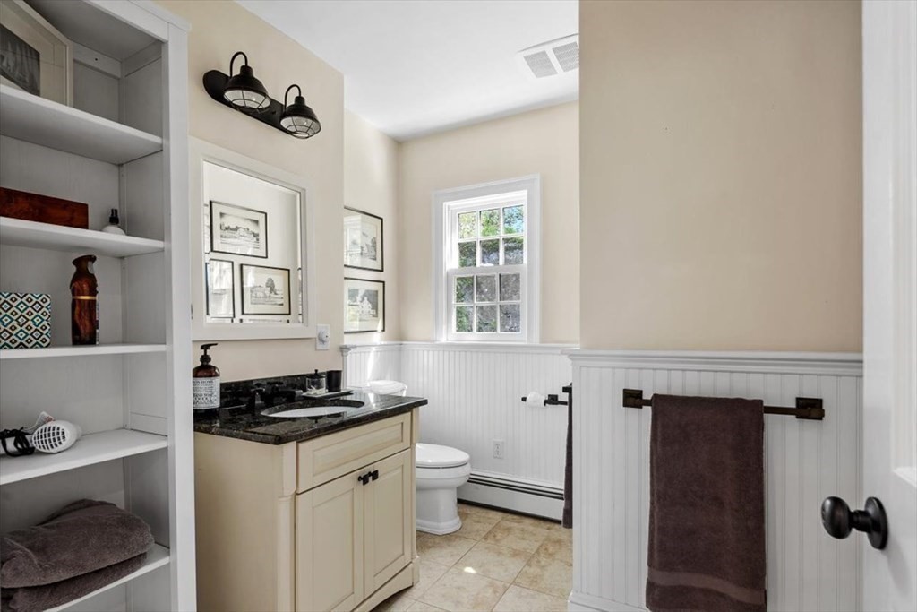 241 Jerusalem Road Cohasset, MA 02025 - Photo 28 of 42 a kitchen with a refrigerator and a stove