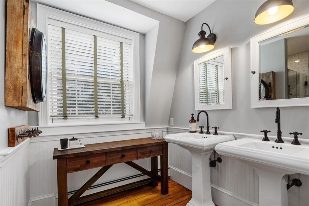 241 Jerusalem Road Cohasset, MA 02025 - Photo 30 of 42 a bathroom with a sink and a mirror