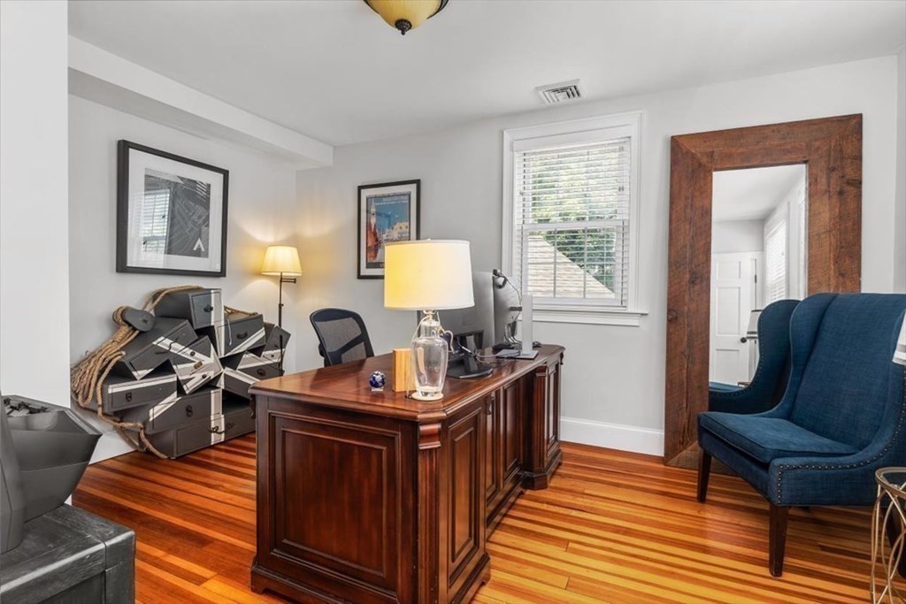 241 Jerusalem Road Cohasset, MA 02025 - Photo 32 of 42 a view of a livingroom with workspace and a couch