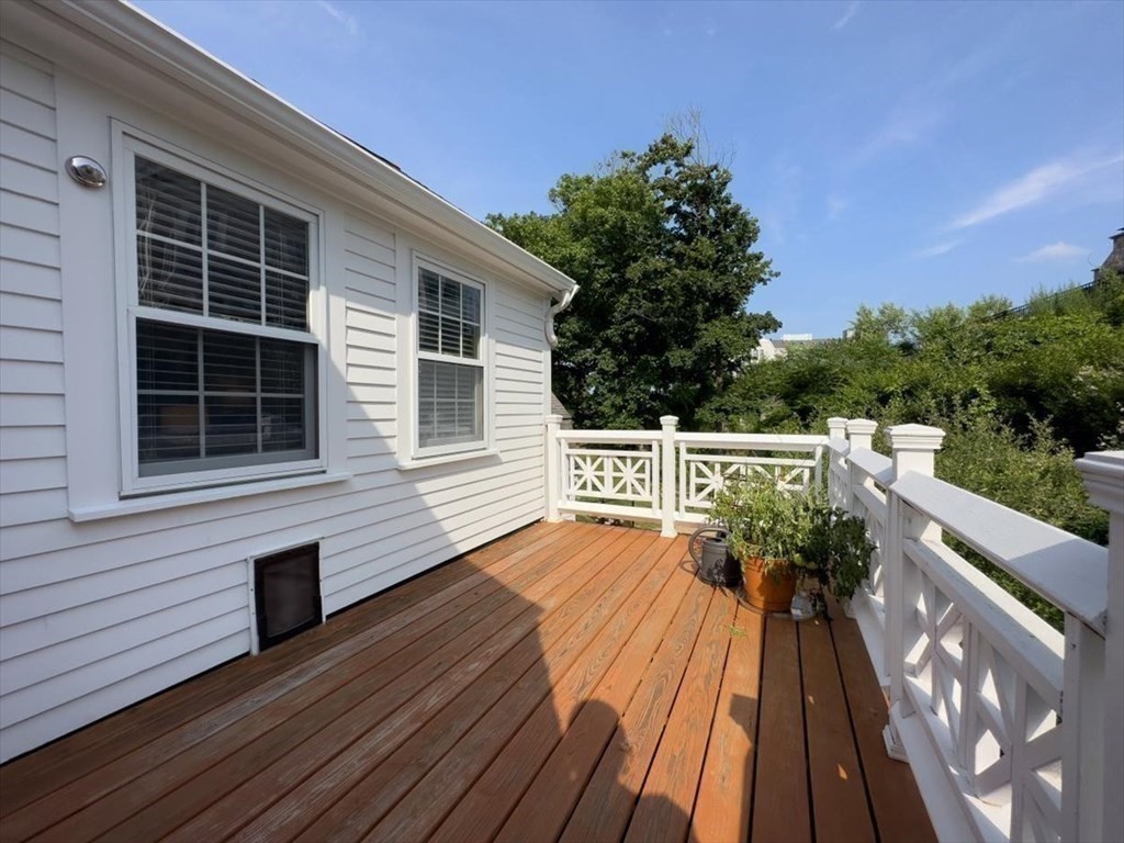 241 Jerusalem Road Cohasset, MA 02025 - Photo 35 of 42 a balcony with wooden floor and outdoor space