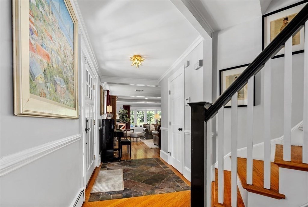 241 Jerusalem Road Cohasset, MA 02025 - Photo 8 of 42 a view of entryway and hall with wooden floor