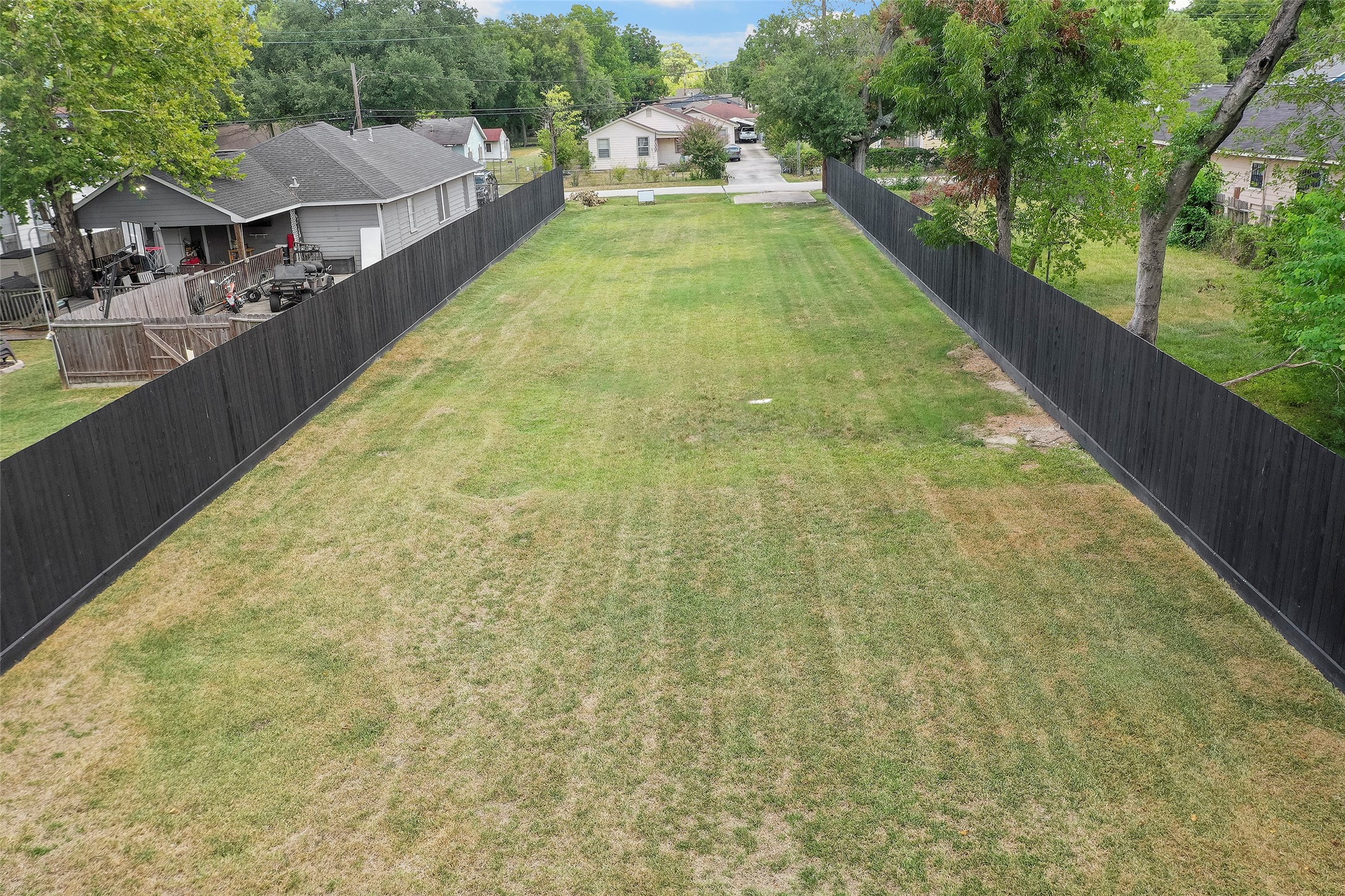 213 Sylvester Road Houston, TX 77009 - Photo 12 of 26 a view of a swimming pool with a garden