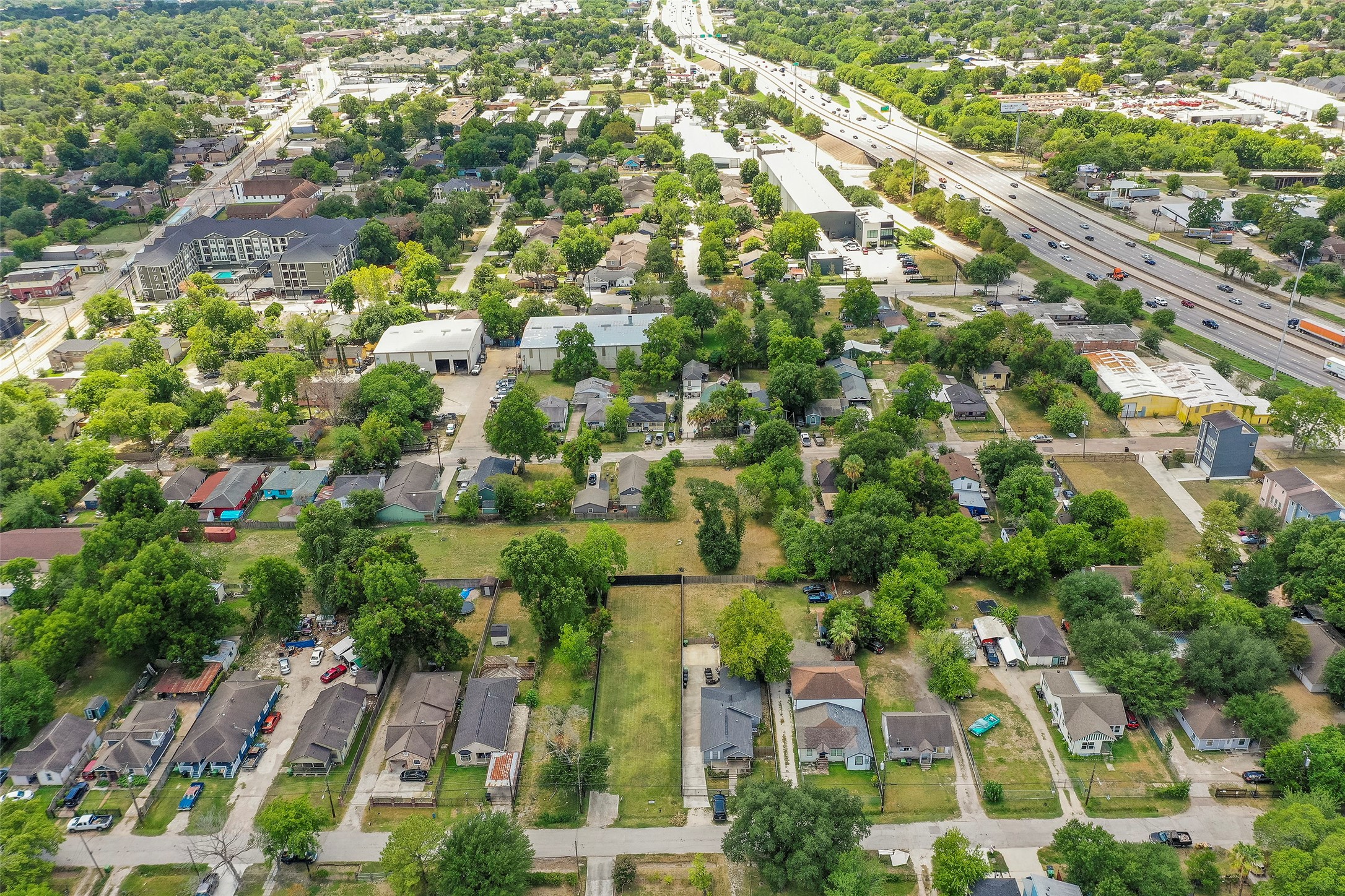 213 Sylvester Road Houston, TX 77009 - Photo 17 of 26 an aerial view of residential houses with outdoor space