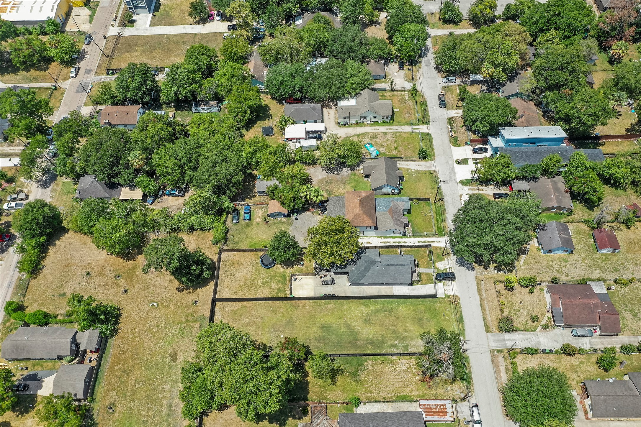 213 Sylvester Road Houston, TX 77009 - Photo 23 of 26 an aerial view of a residential apartment building with a yard