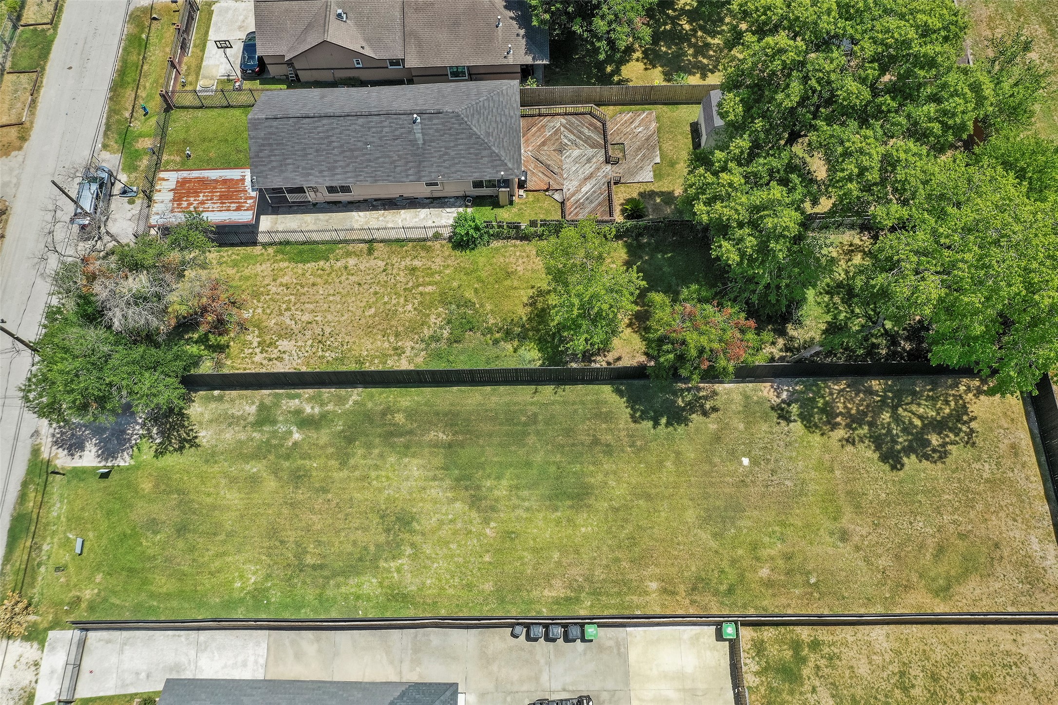 213 Sylvester Road Houston, TX 77009 - Photo 24 of 26 an aerial view of residential houses with outdoor space and swimming pool