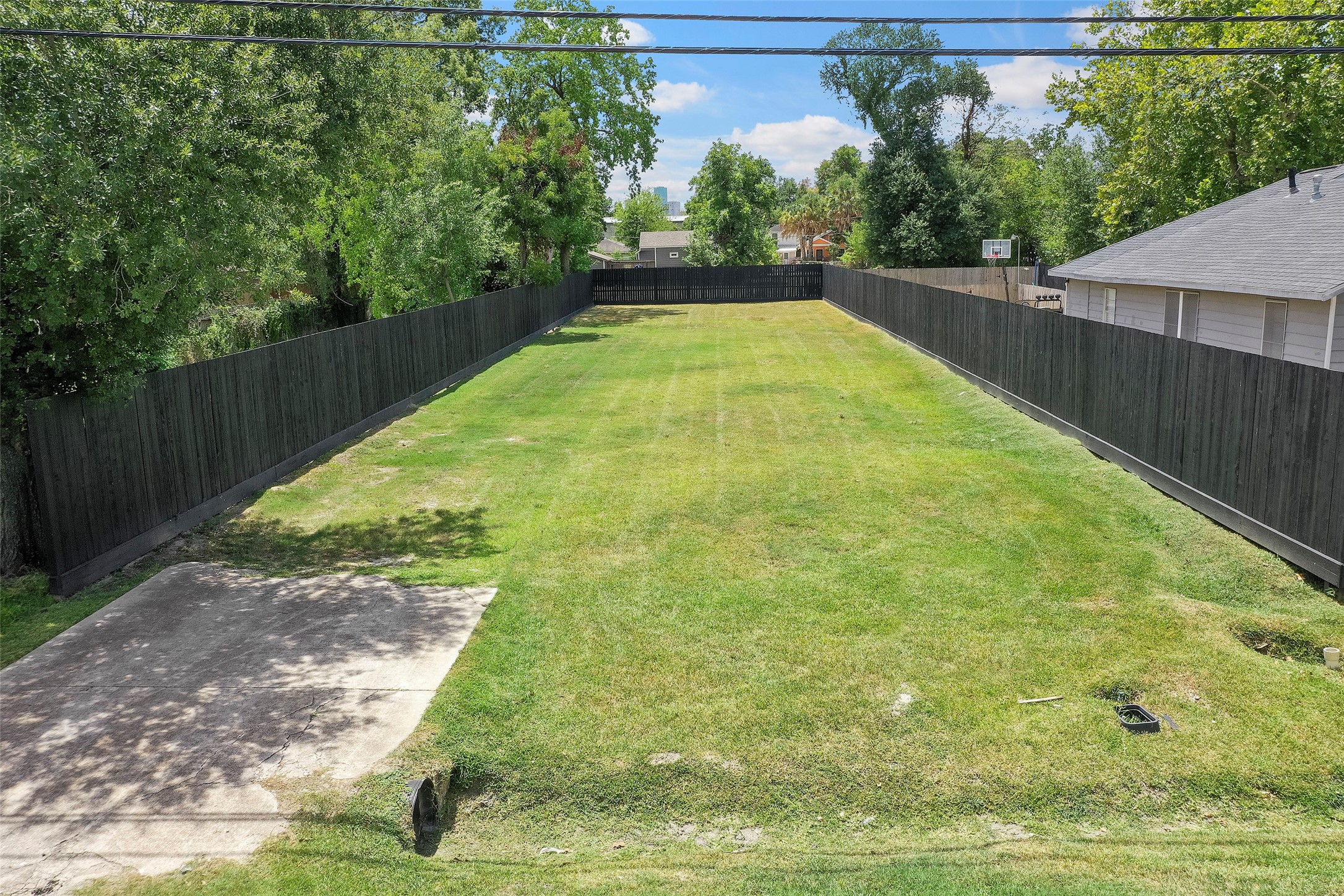 213 Sylvester Road Houston, TX 77009 - Photo 26 of 26 a view of yard with swimming pool