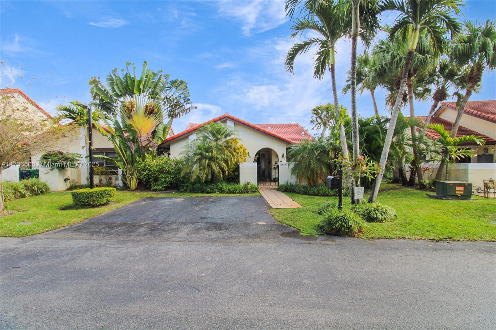 6425 Southwest 133rd Place Miami, FL 33183 - Photo 1 of 25 a view of a back yard with palm trees