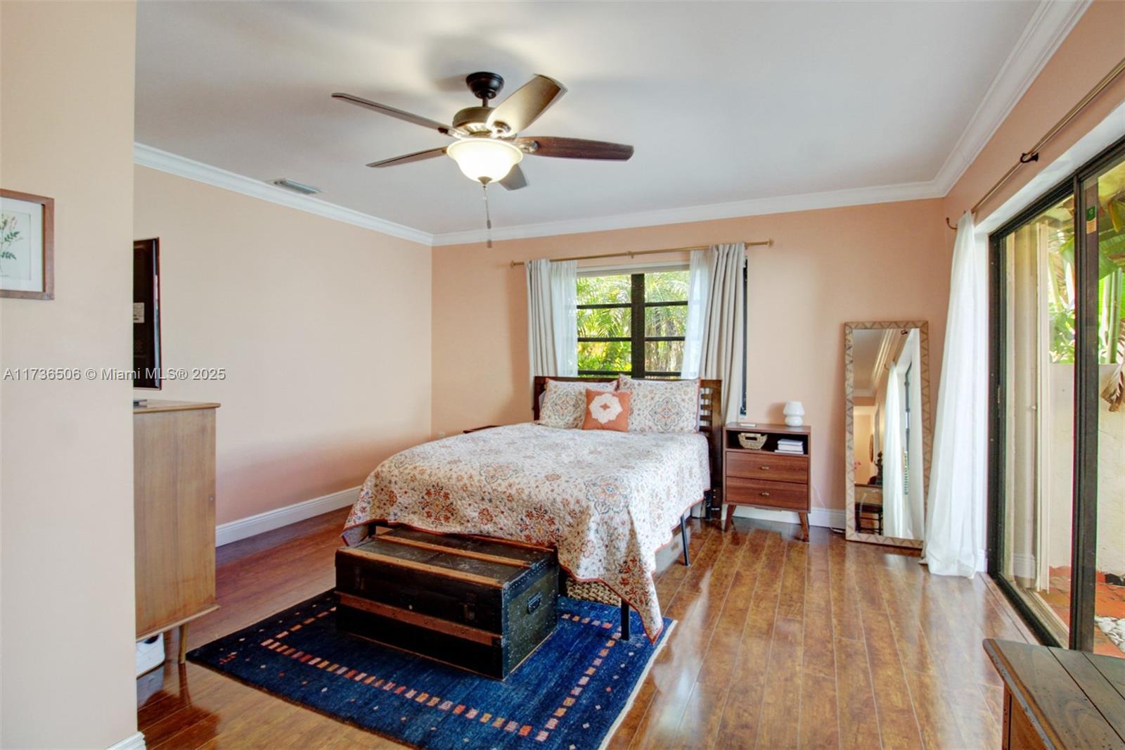6425 Southwest 133rd Place Miami, FL 33183 - Photo 12 of 25 a bed room with a bed and a chandelier