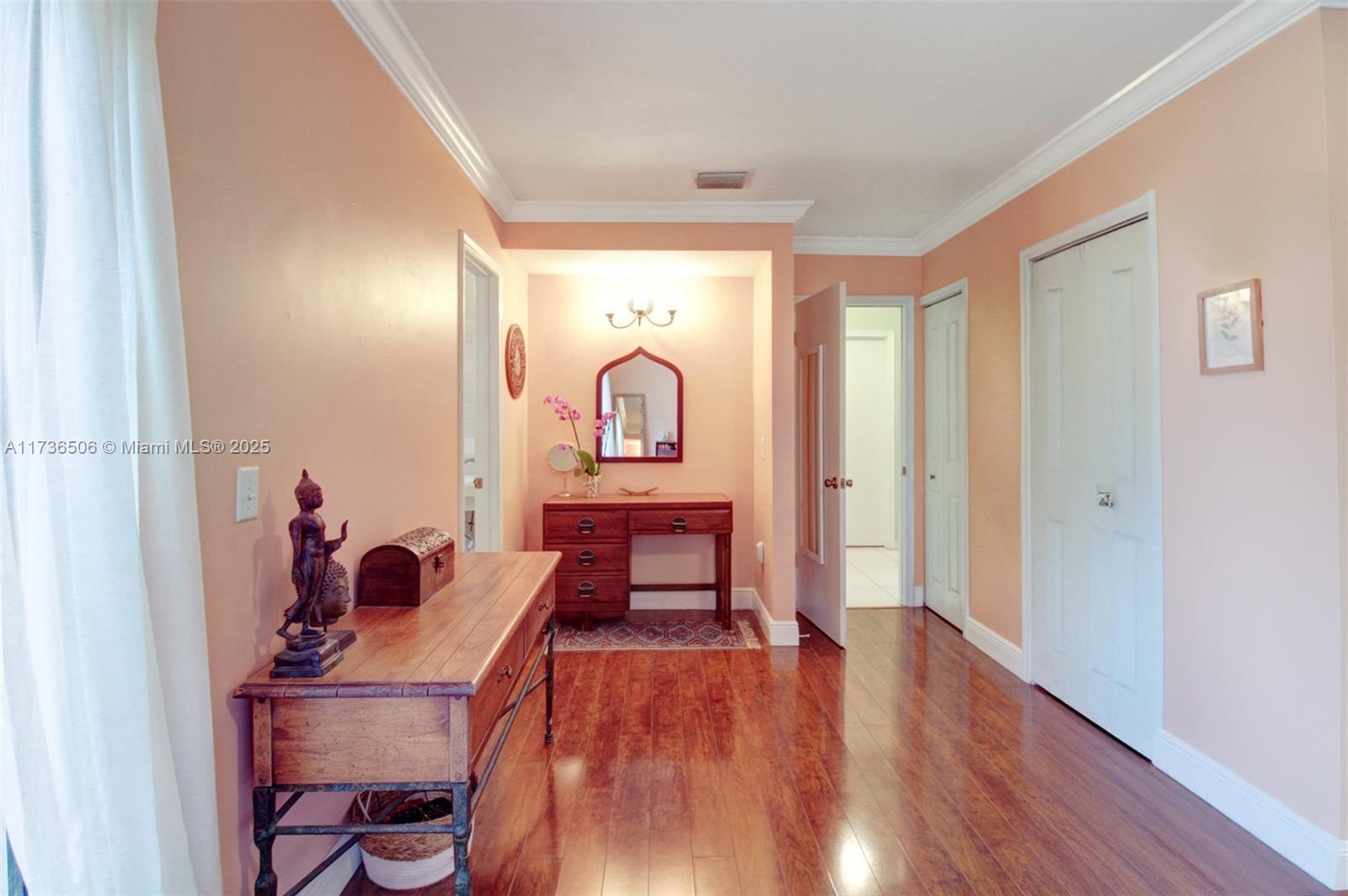 6425 Southwest 133rd Place Miami, FL 33183 - Photo 18 of 25 a living room with furniture and a wooden floor