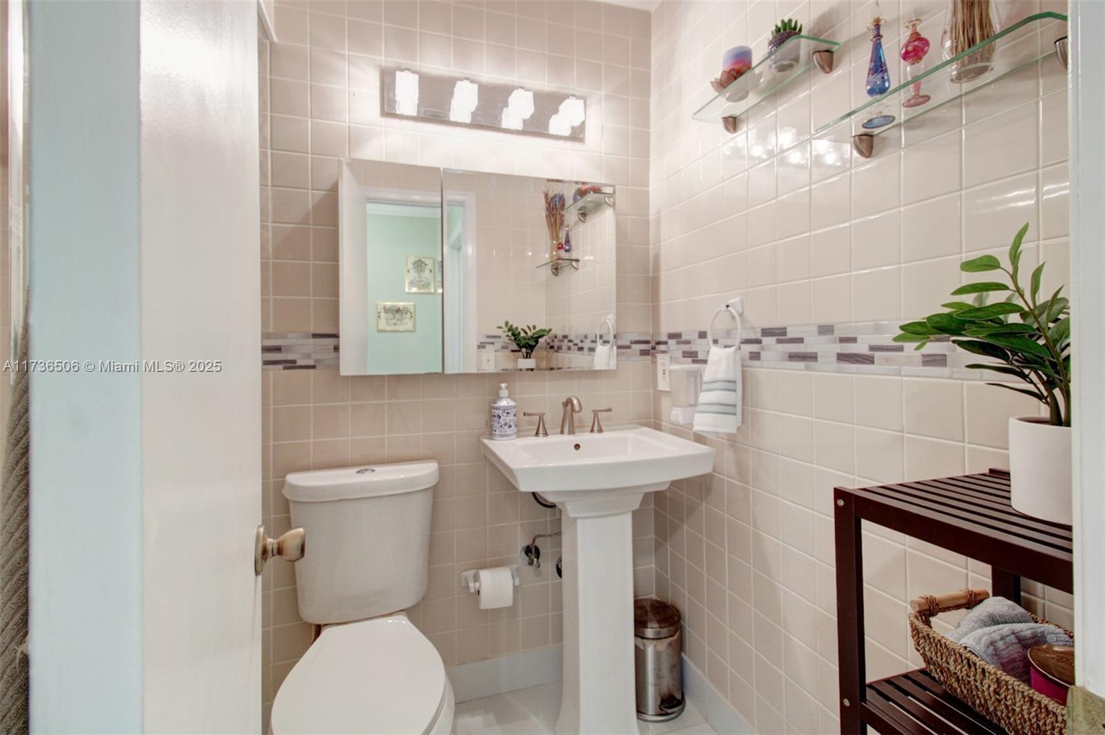 6425 Southwest 133rd Place Miami, FL 33183 - Photo 19 of 25 a bathroom with a sink toilet and shower