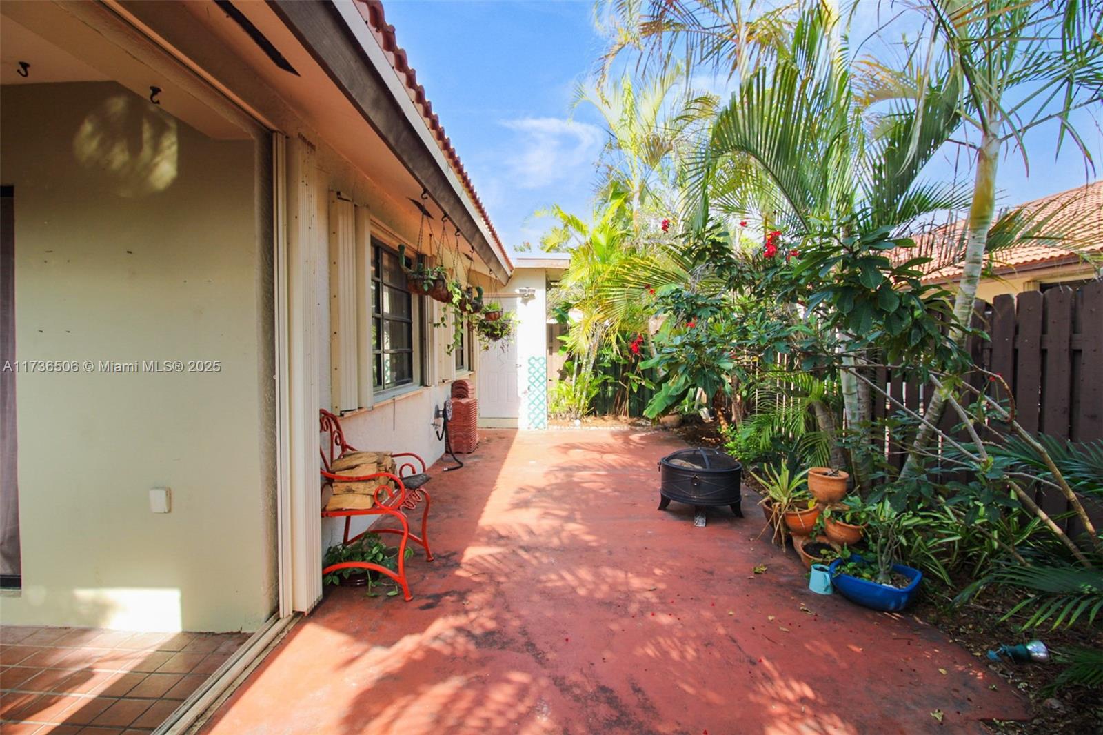 6425 Southwest 133rd Place Miami, FL 33183 - Photo 25 of 25 a view of a path along with potted plants