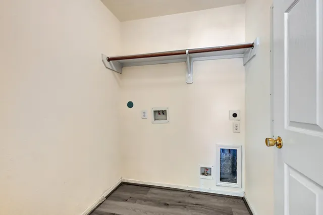a view of small space with wooden floor