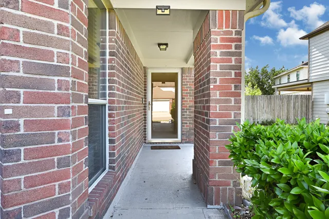 a view of a brick buildings with an outdoor space