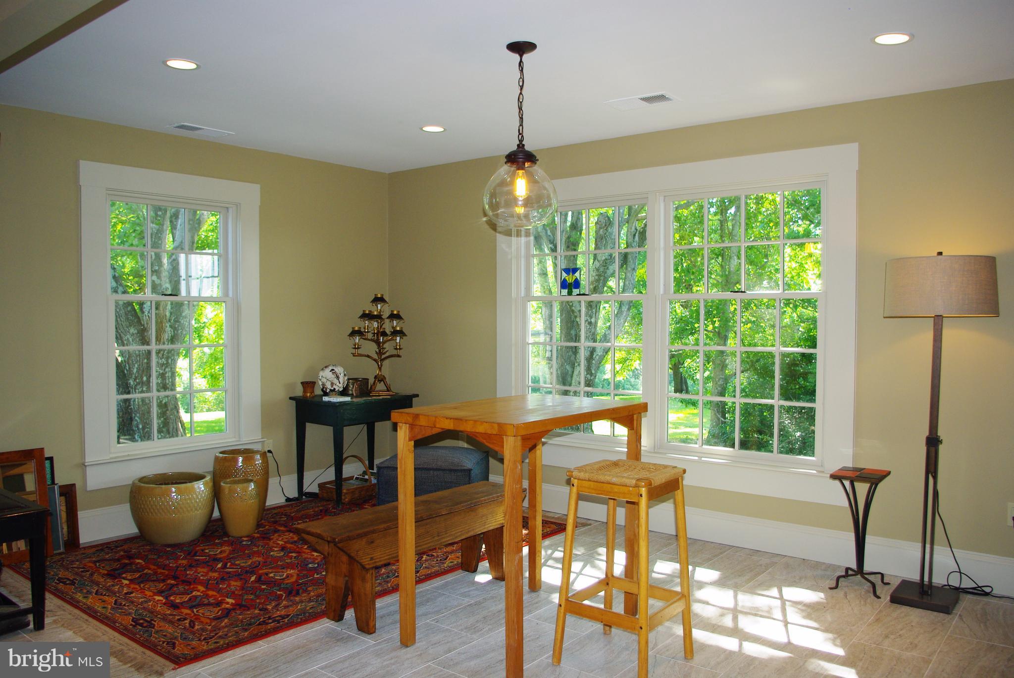 3699 Slate Mills Road Sperryville, VA 22740 - Photo 6 of 21 Light-filled dining room