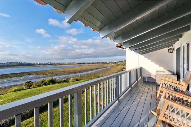 a view of balcony with furniture