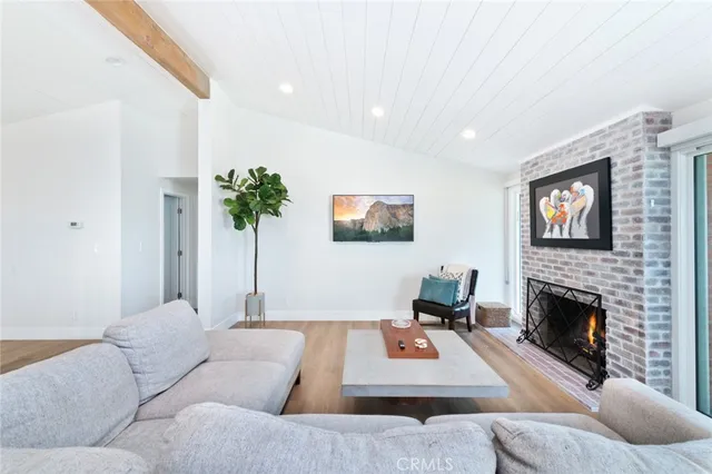 a large kitchen with a table and chairs