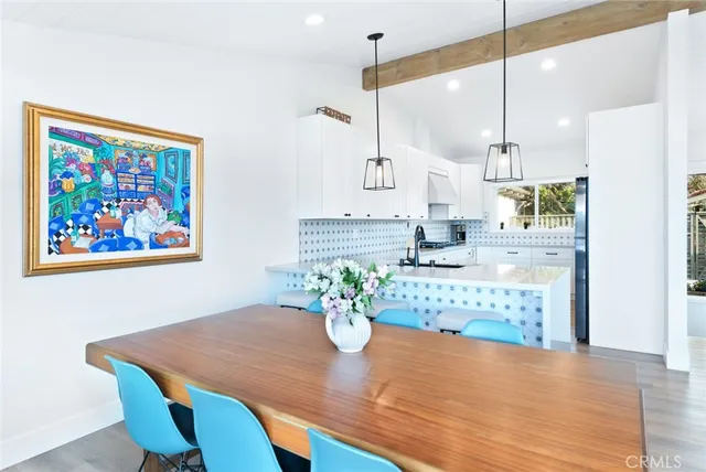 a bathroom with vanity and mirror